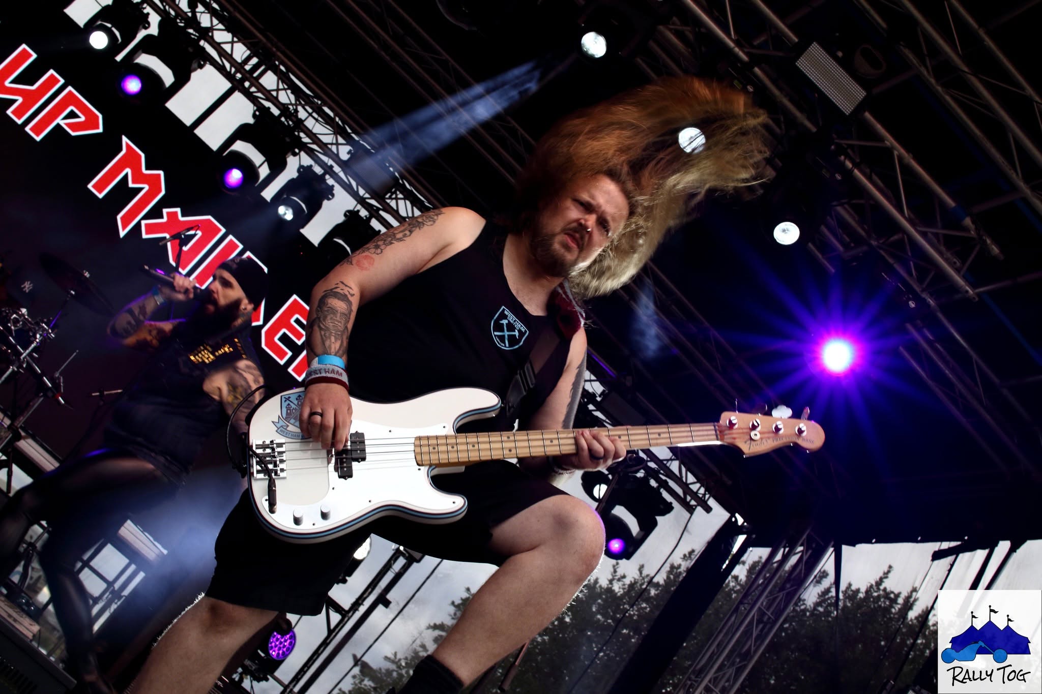 Ey Up Maiden bassist mid hair flip