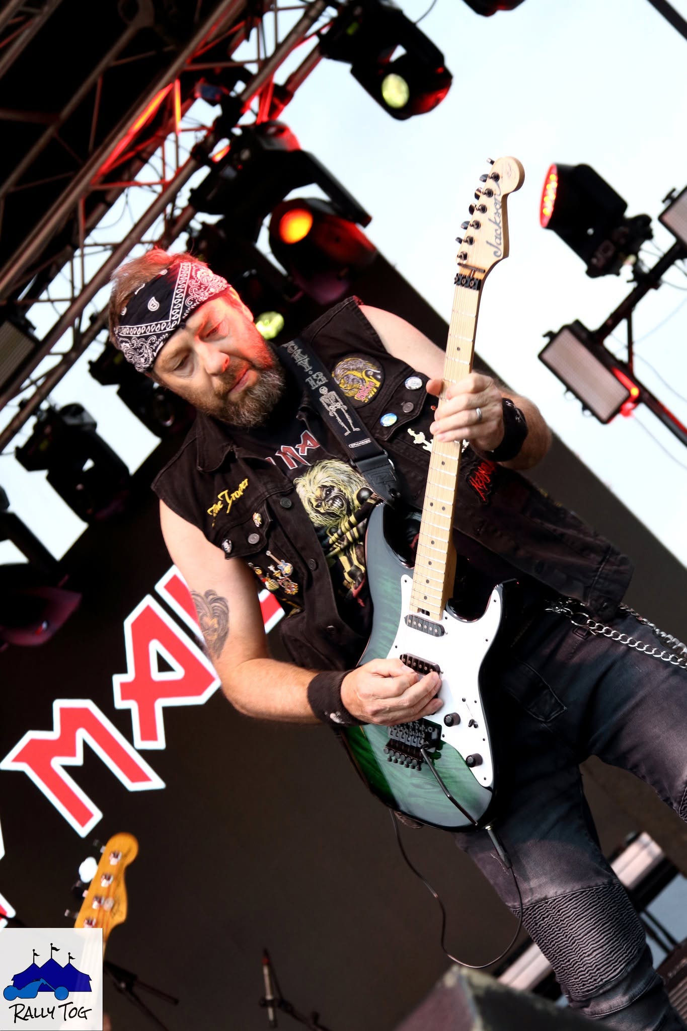 Ey Up Maiden guitarist with green Jackson guitar